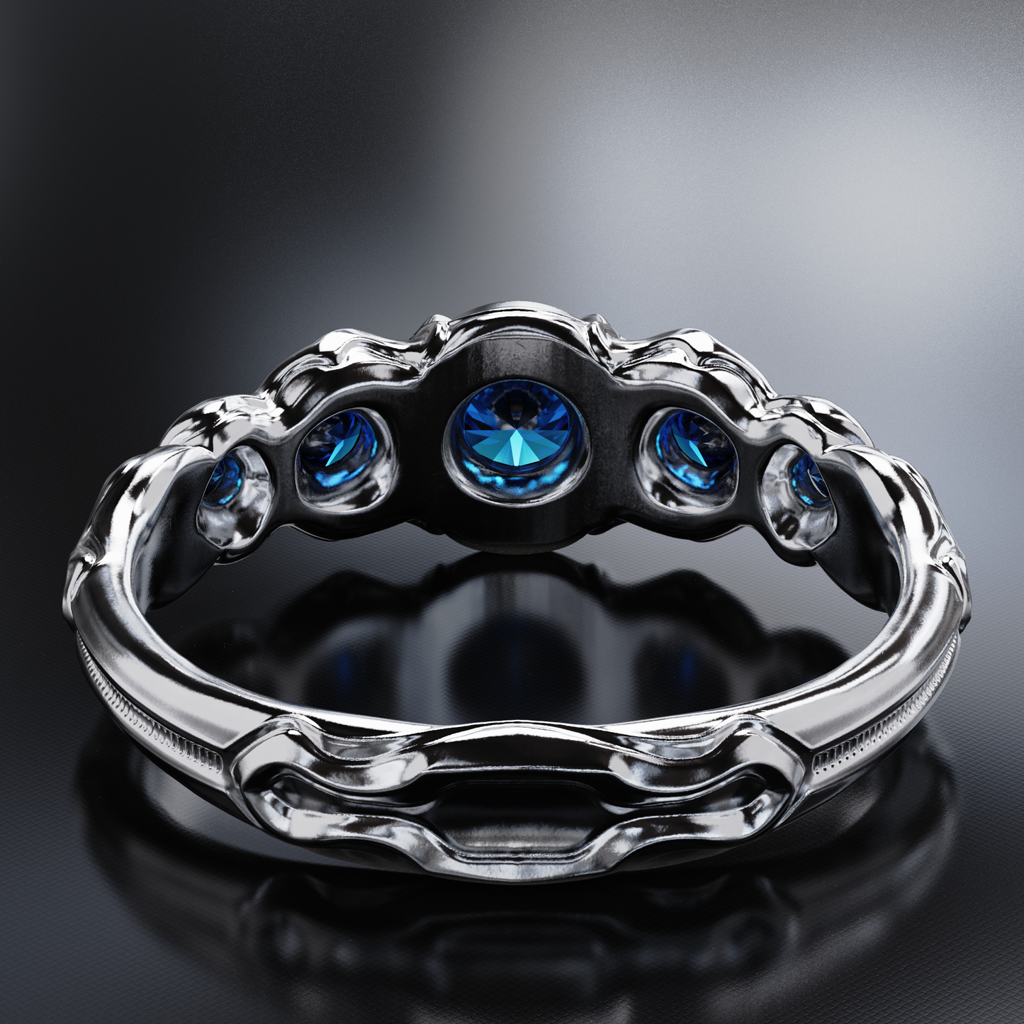 Flow Sterling Silver Ring with Blue Sapphires