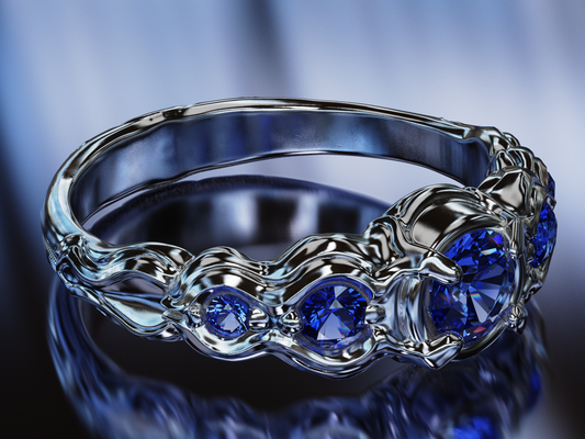 Flow Sterling Silver Ring with Blue Sapphires