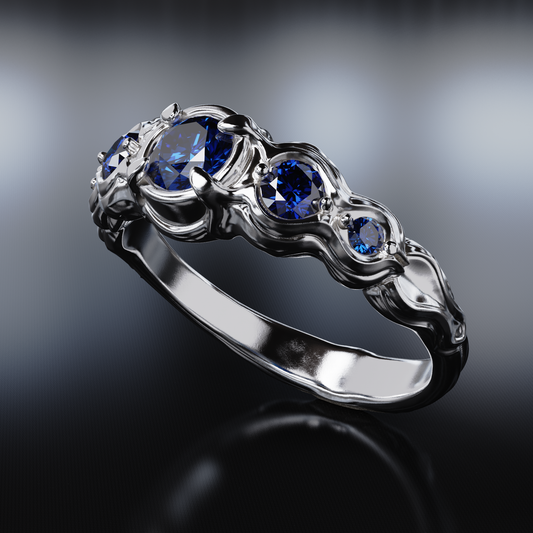 Flow Sterling Silver Ring with Blue Sapphires