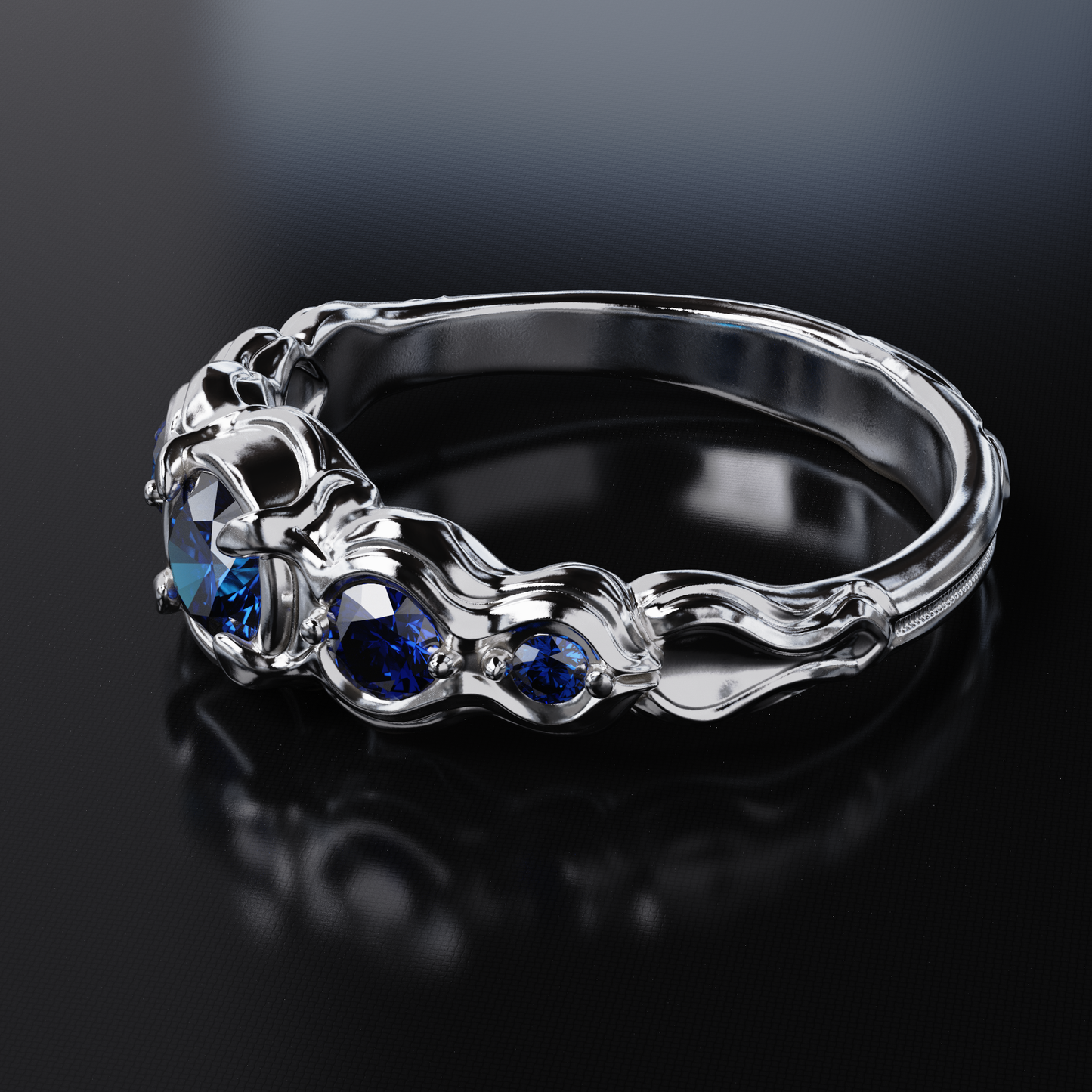 Flow Sterling Silver Ring with Blue Sapphires