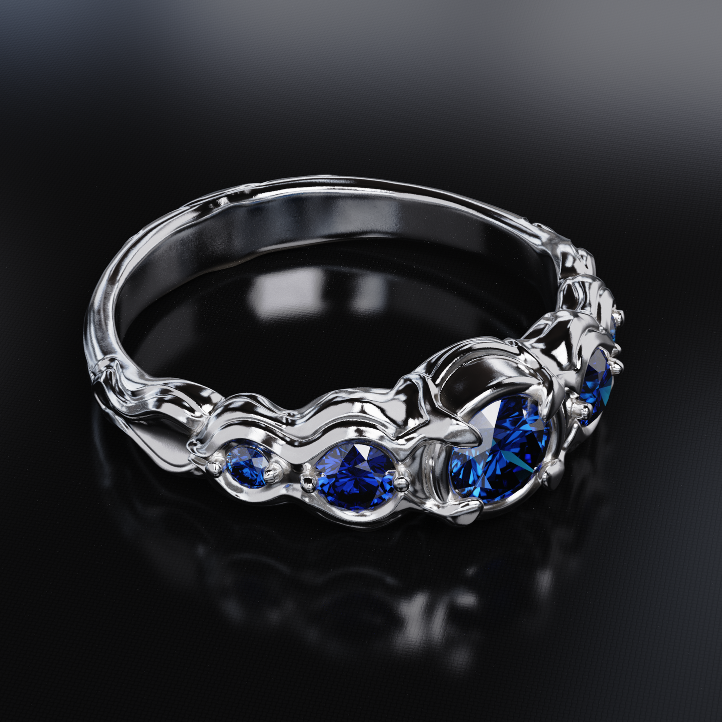 Flow Sterling Silver Ring with Blue Sapphires