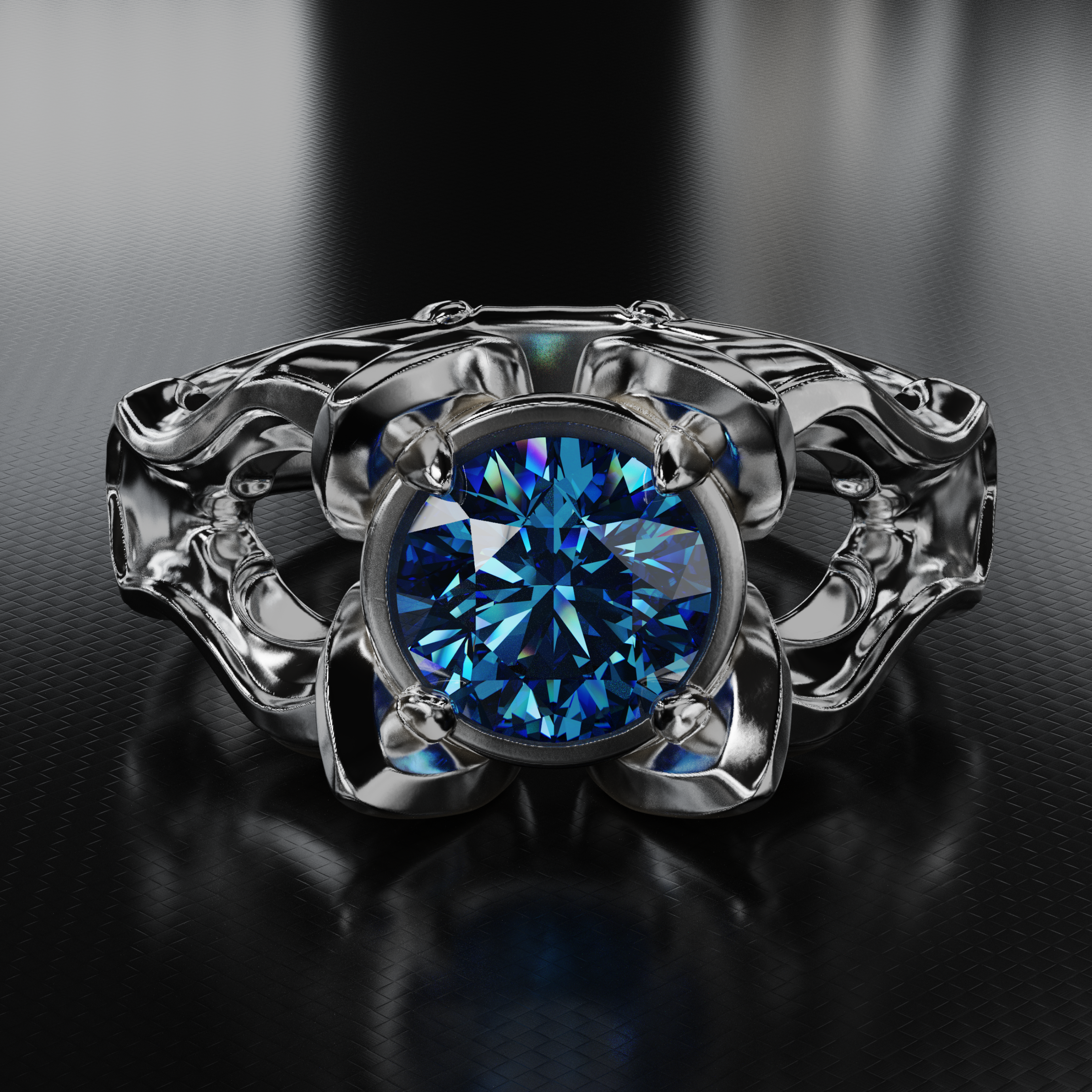 Silver ring with a blue gemstone on a dark background