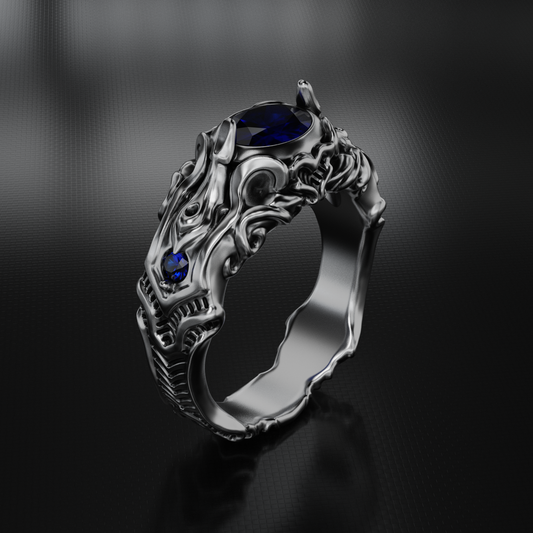 Silver ring with blue gemstones on a dark background
